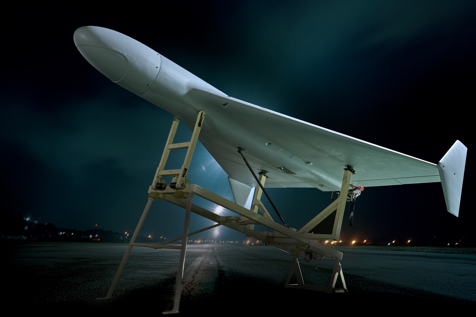 Aircraft on launcher at night